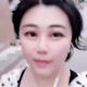 This screenshot was taking from a moving clip, which appears to have used a face filter.